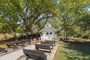 view of home's community featuring an outdoor structure