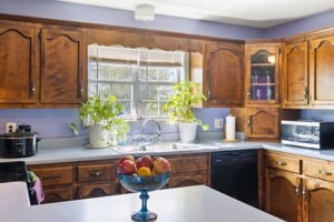 kitchen featuring sink and black dishwasher