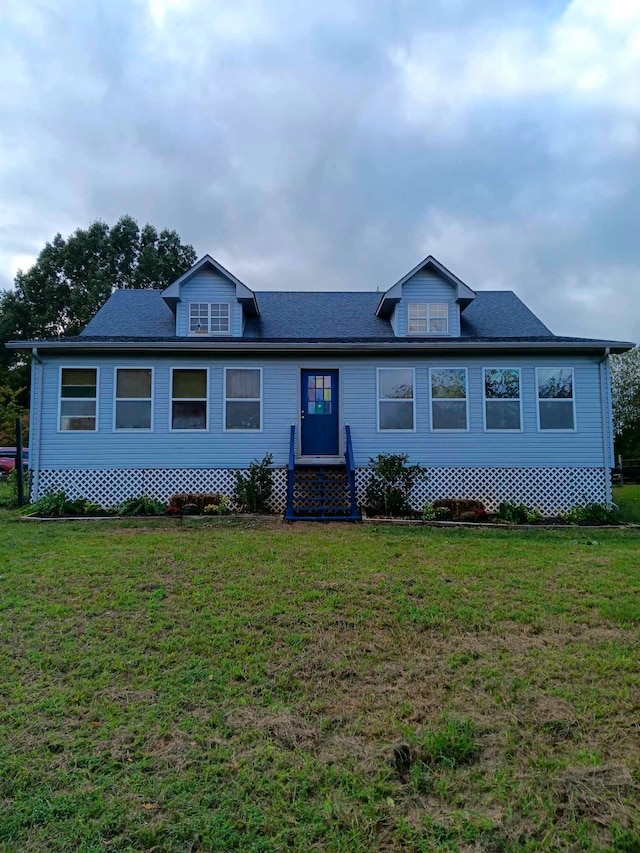 view of front of home featuring a front yard