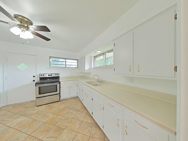 kitchen featuring ceiling fan, white cabinets, sink, and stainless steel electric range