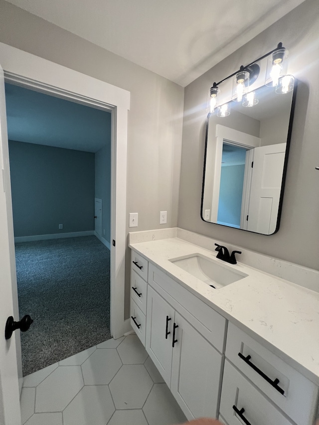 bathroom with vanity and tile patterned floors