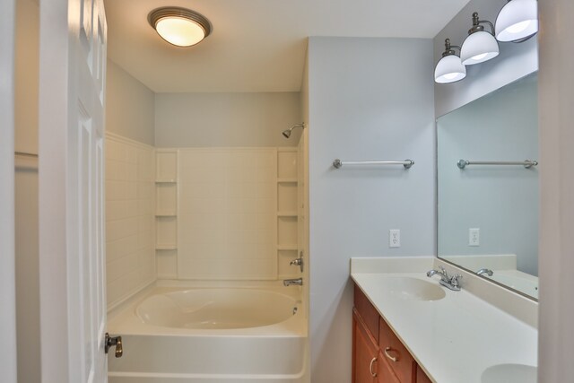 bathroom with vanity and shower / bathing tub combination