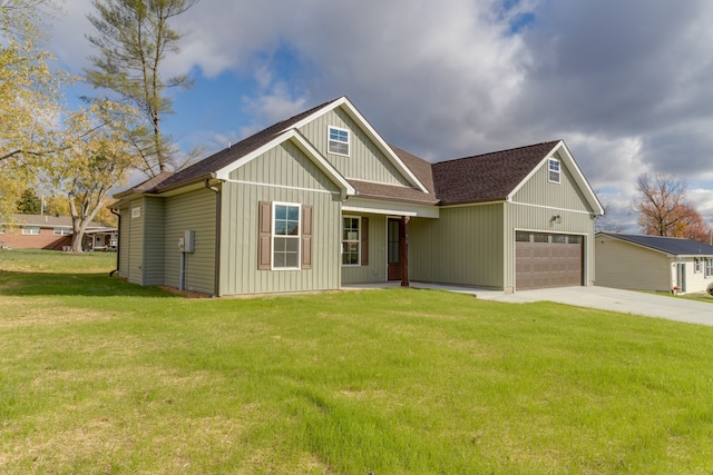 view of front of house featuring a front yard and a garage