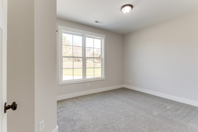 view of carpeted spare room