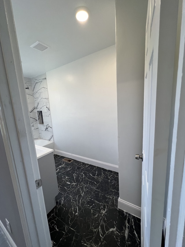 bathroom with washer / dryer