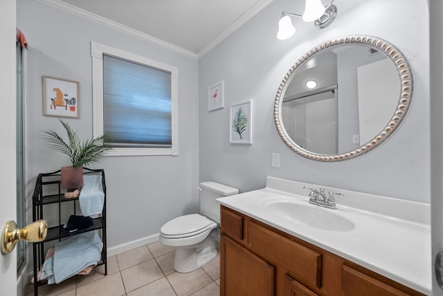 bathroom with crown molding, baseboards, toilet, vanity, and tile patterned flooring