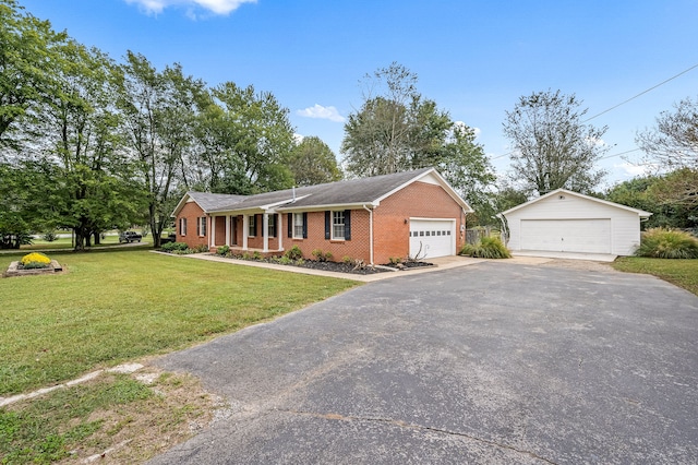 single story home featuring a garage and a front yard