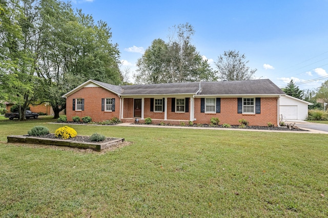 ranch-style home with a garage and a front lawn