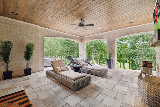 view of patio / terrace featuring ceiling fan