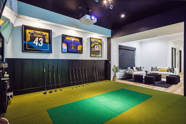 recreation room with golf simulator and wood-type flooring