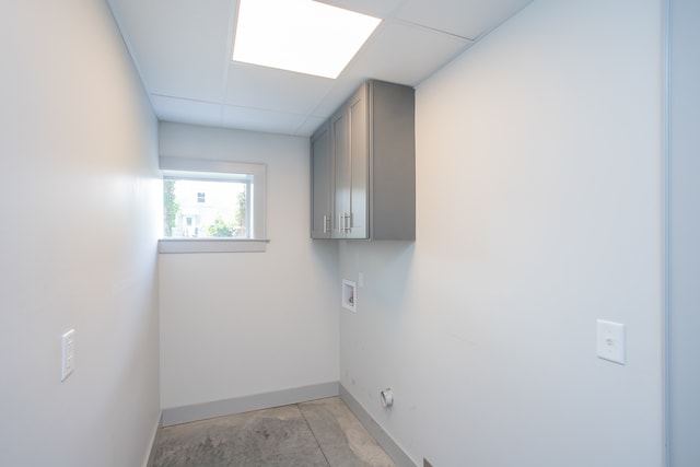 laundry room with cabinets and washer hookup