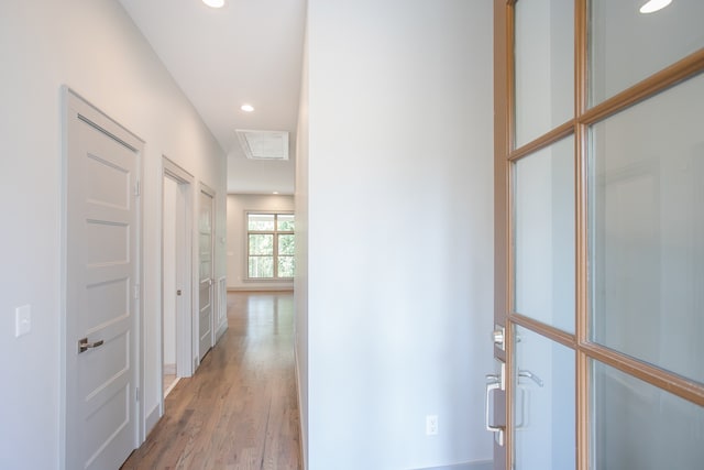 hallway featuring light hardwood / wood-style floors