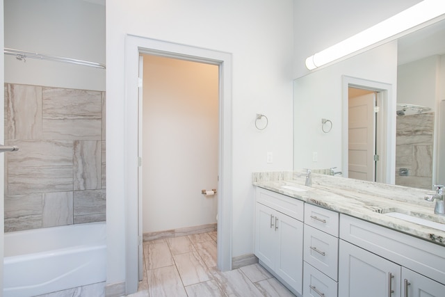 bathroom featuring plus walk in shower and vanity