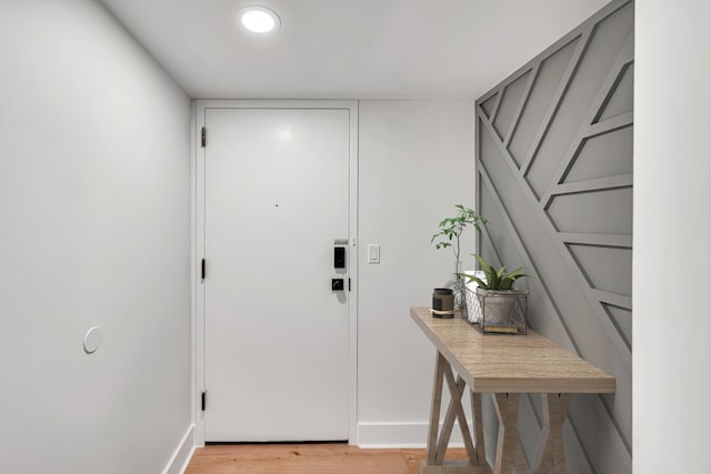 entryway with light hardwood / wood-style floors