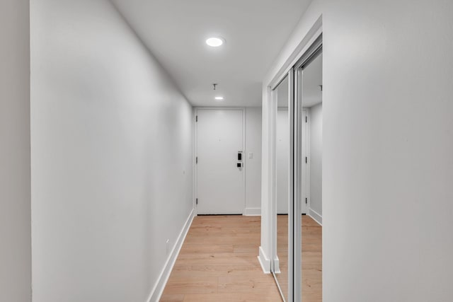 corridor featuring light hardwood / wood-style flooring