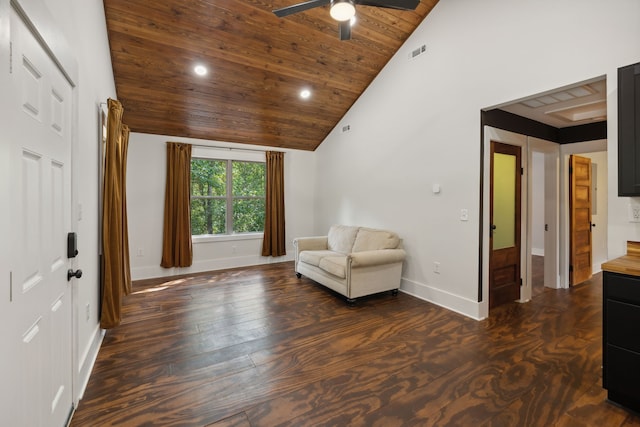 unfurnished room featuring ceiling fan, wood ceiling, dark hardwood / wood-style floors, and high vaulted ceiling