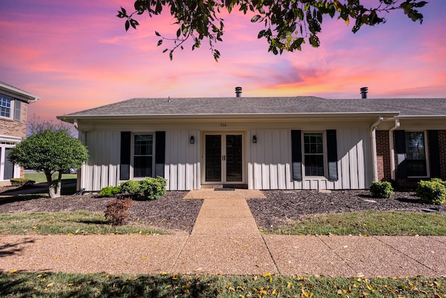 ranch-style home with a garage