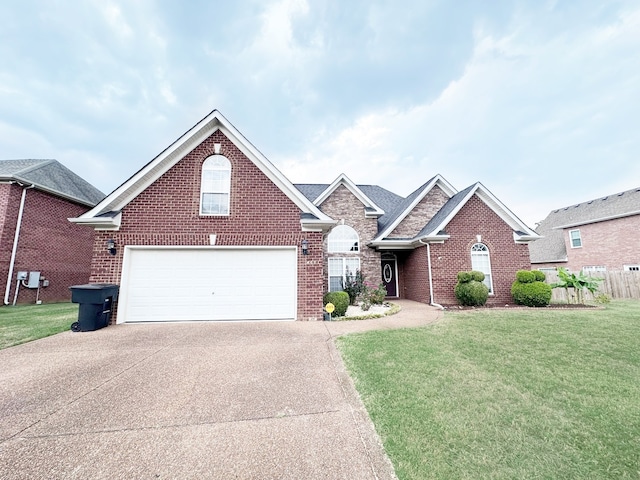 view of front facade featuring a garage and a front lawn