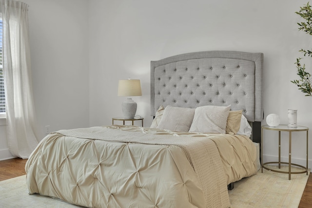 bedroom featuring hardwood / wood-style floors