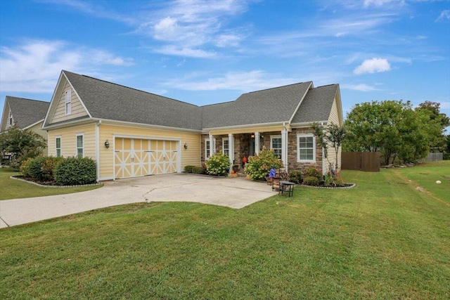 view of front facade featuring a front yard and a garage