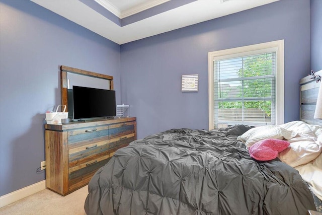 bedroom featuring light colored carpet and crown molding