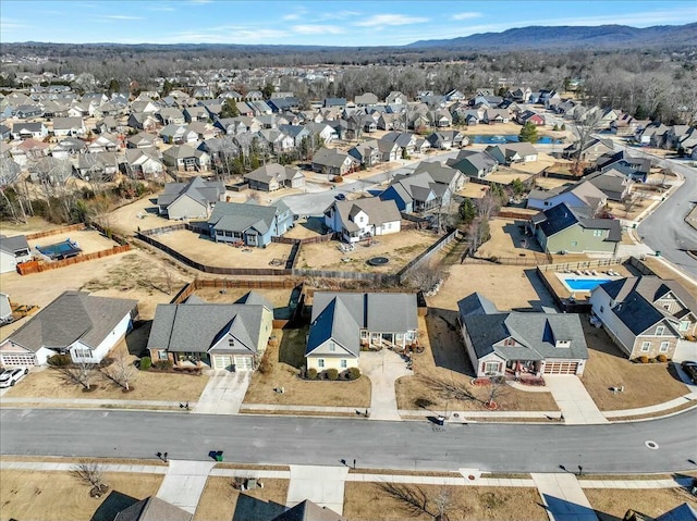 drone / aerial view with a mountain view and a residential view