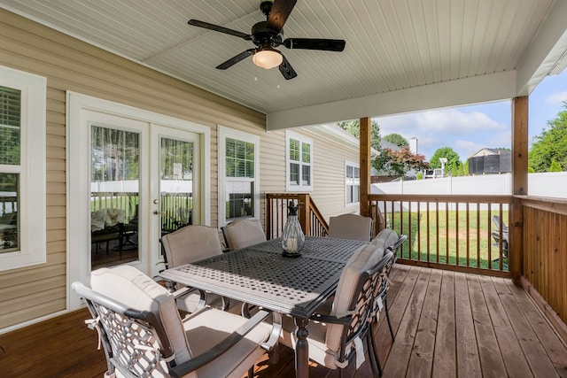 wooden terrace featuring ceiling fan