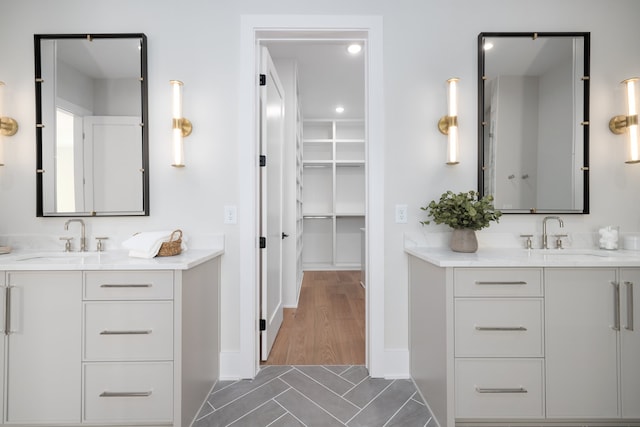 bathroom featuring hardwood / wood-style floors and vanity