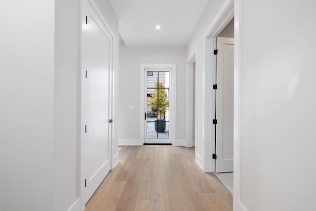 corridor featuring light hardwood / wood-style flooring