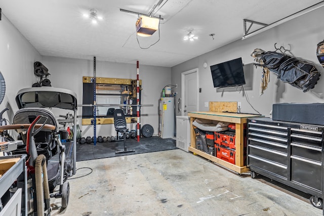 garage featuring water heater and a garage door opener