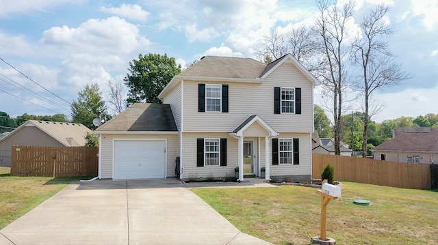 view of front of home with a garage and a front lawn