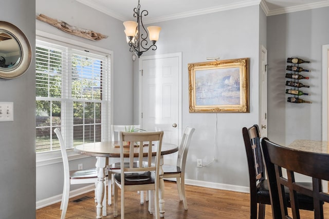 4115 Chancellor Dr, Thompsons Station, TN 37179 - dining area with baseboards, visible vents, wood finished floors, and crown molding