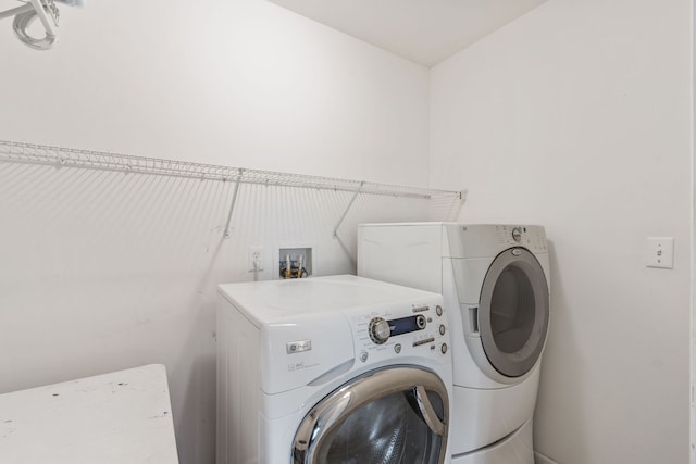 laundry area with washing machine and dryer