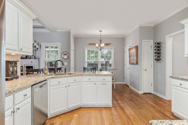 kitchen with white cabinets, light hardwood / wood-style flooring, sink, and stainless steel dishwasher