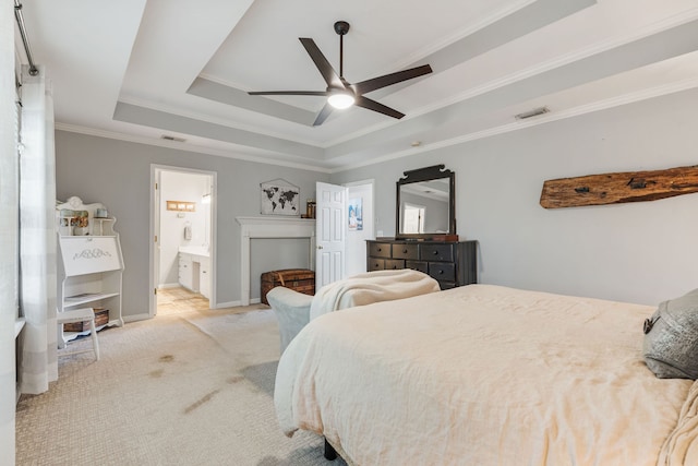 bedroom featuring ceiling fan, a raised ceiling, and crown molding