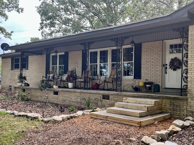 exterior space featuring covered porch