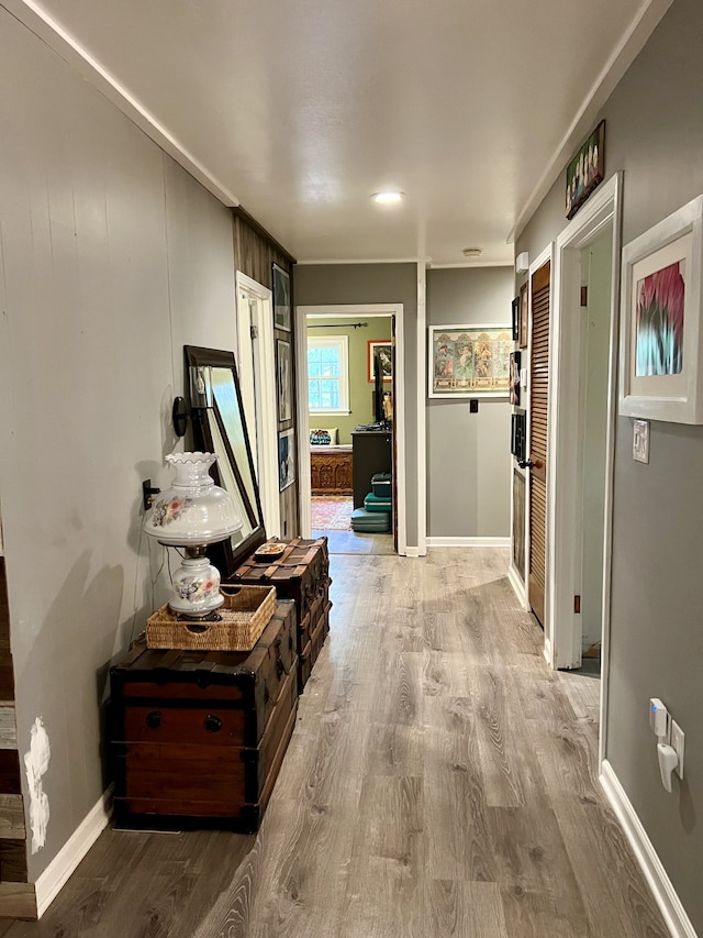 hall with light wood-type flooring