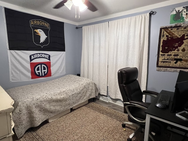 bedroom featuring ceiling fan