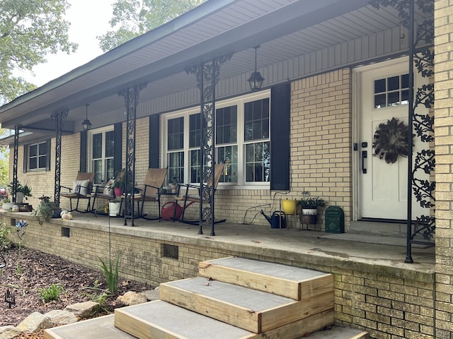 entrance to property with covered porch