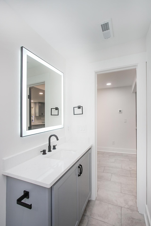 bathroom featuring vanity