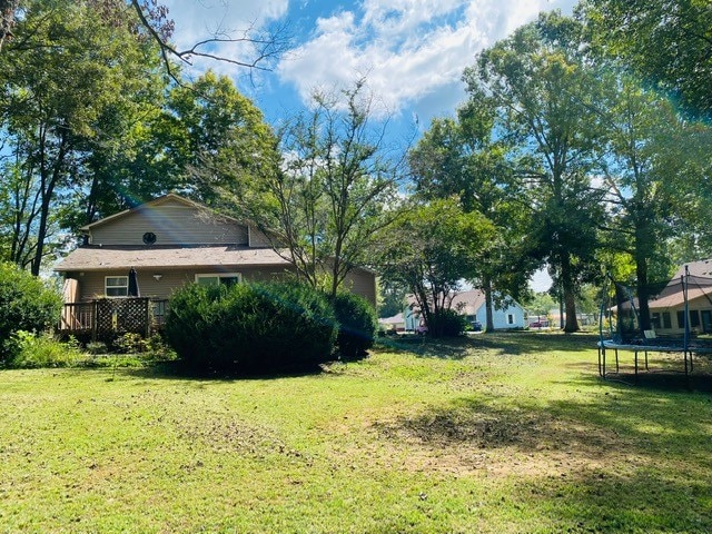 view of yard featuring a deck