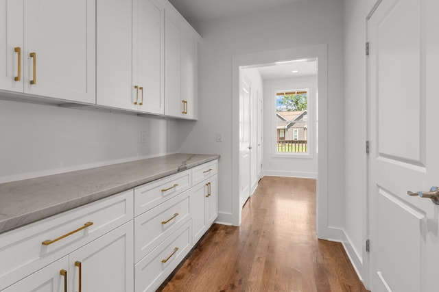 interior space with dark hardwood / wood-style floors