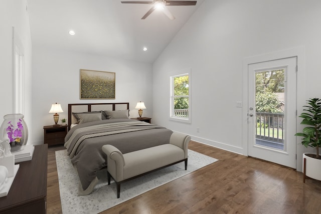 bedroom featuring multiple windows, high vaulted ceiling, ceiling fan, and access to exterior