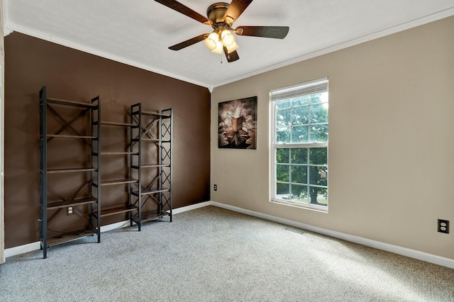 miscellaneous room featuring ceiling fan, carpet floors, and crown molding