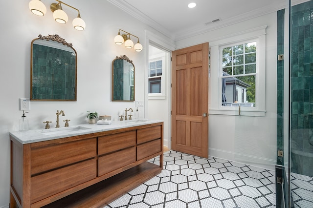 bathroom featuring ornamental molding, vanity, and a shower with door