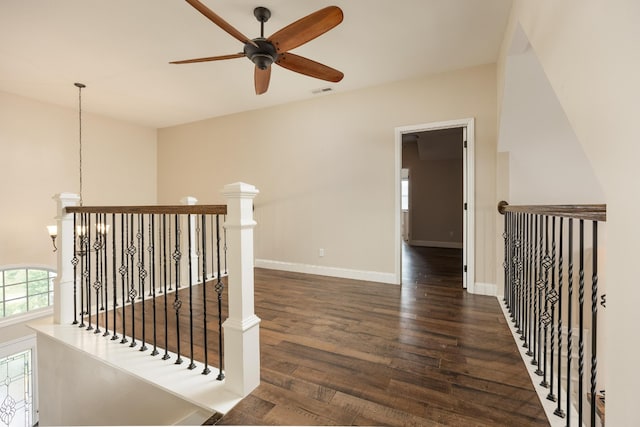 hall with dark hardwood / wood-style flooring