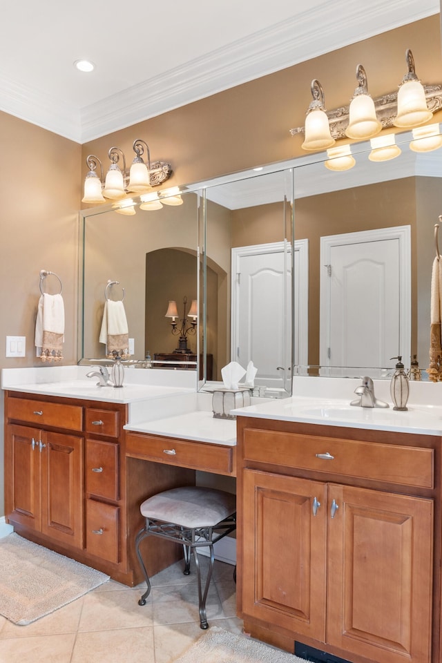 bathroom featuring ornamental molding, tile patterned flooring, and vanity