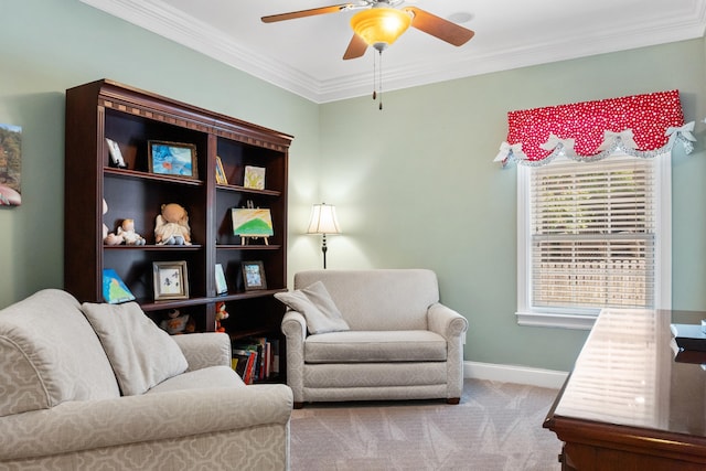 carpeted living room with ornamental molding and ceiling fan