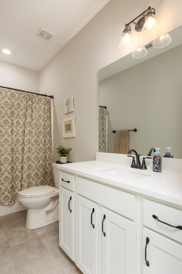 bathroom with vanity, tile patterned flooring, toilet, and a shower with shower curtain