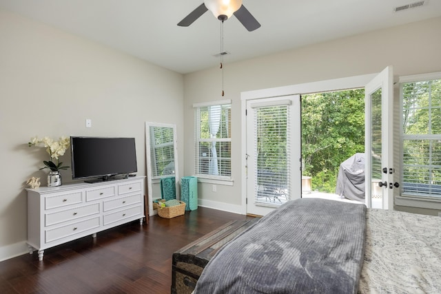 bedroom featuring access to outside, dark wood-type flooring, and ceiling fan